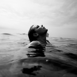Women in water shows the power of mindful breathing